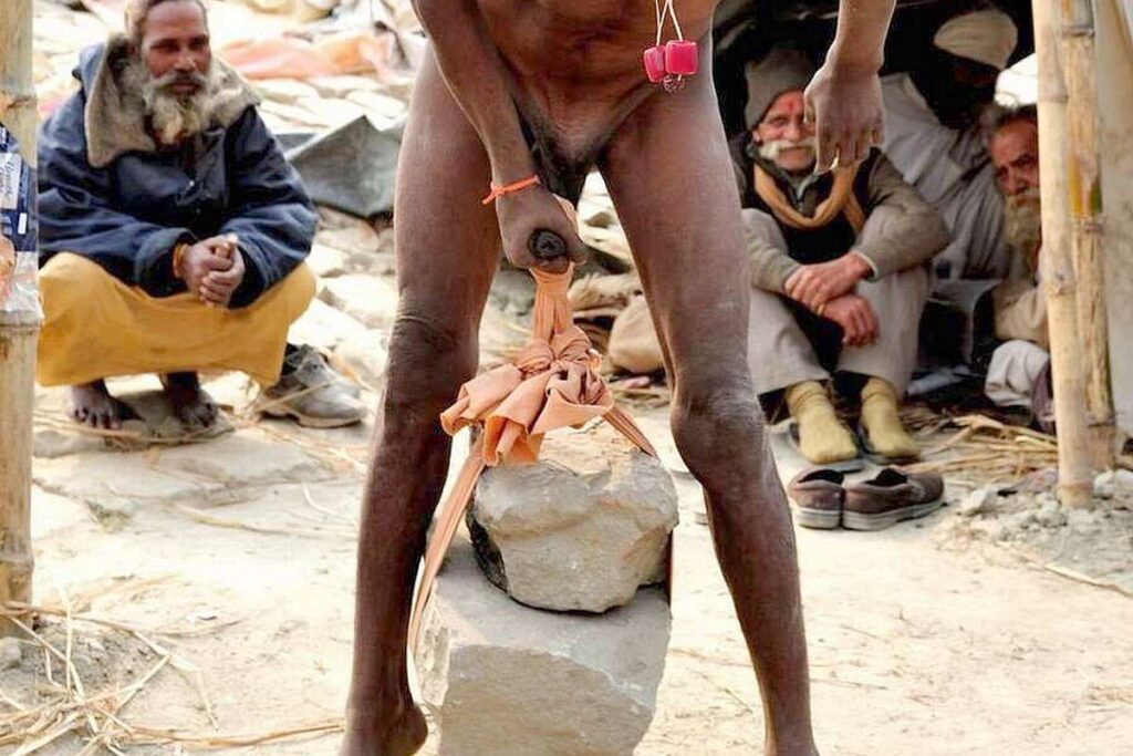 the strange ritual of sadhu lifting stone with penis