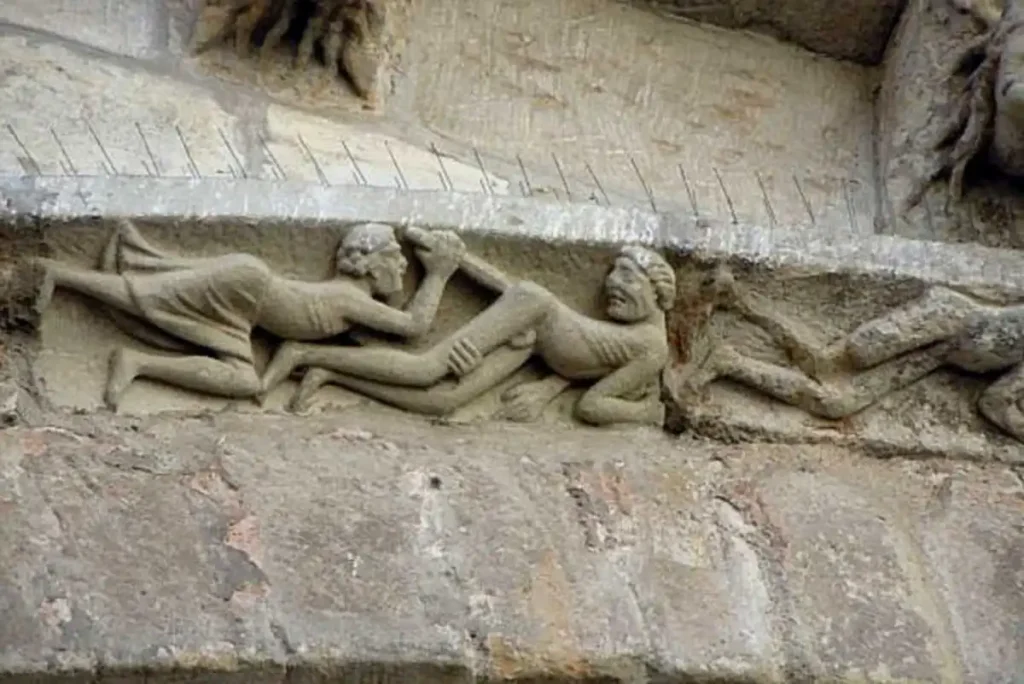 Erotic sculptures on a church in France